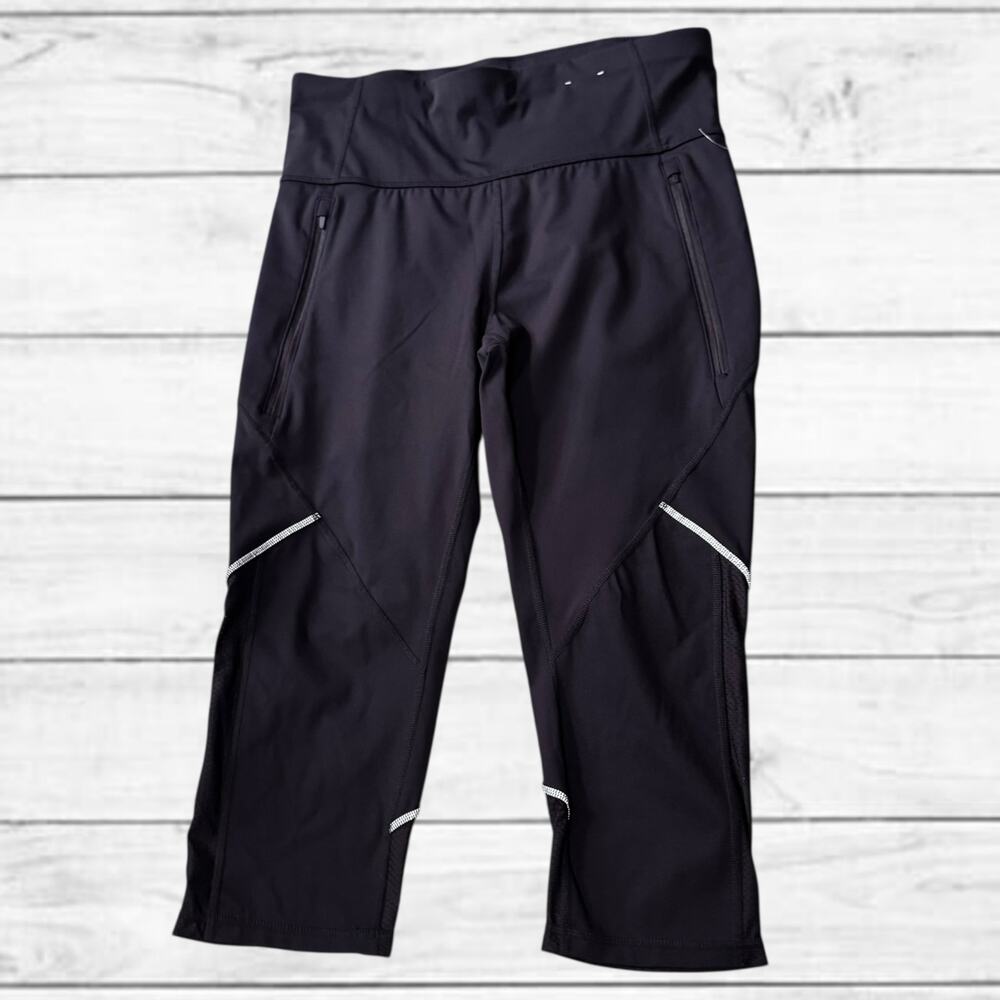 65. NWOT Xersion Quick Dry Black Capri Leggings With Zip Pockets SzLarge